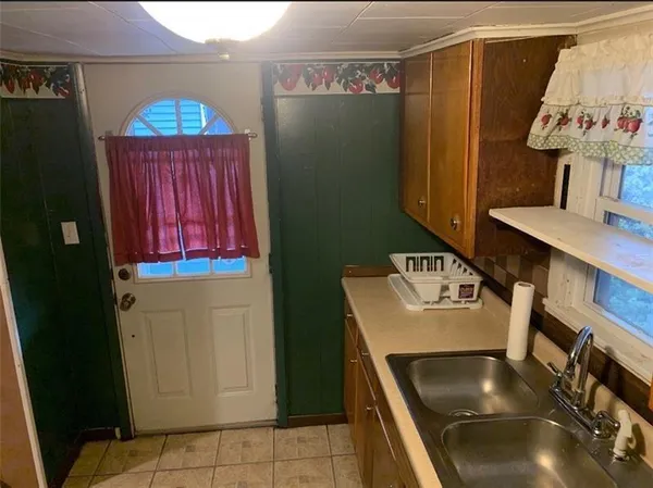 a bathroom with a sink and a shower