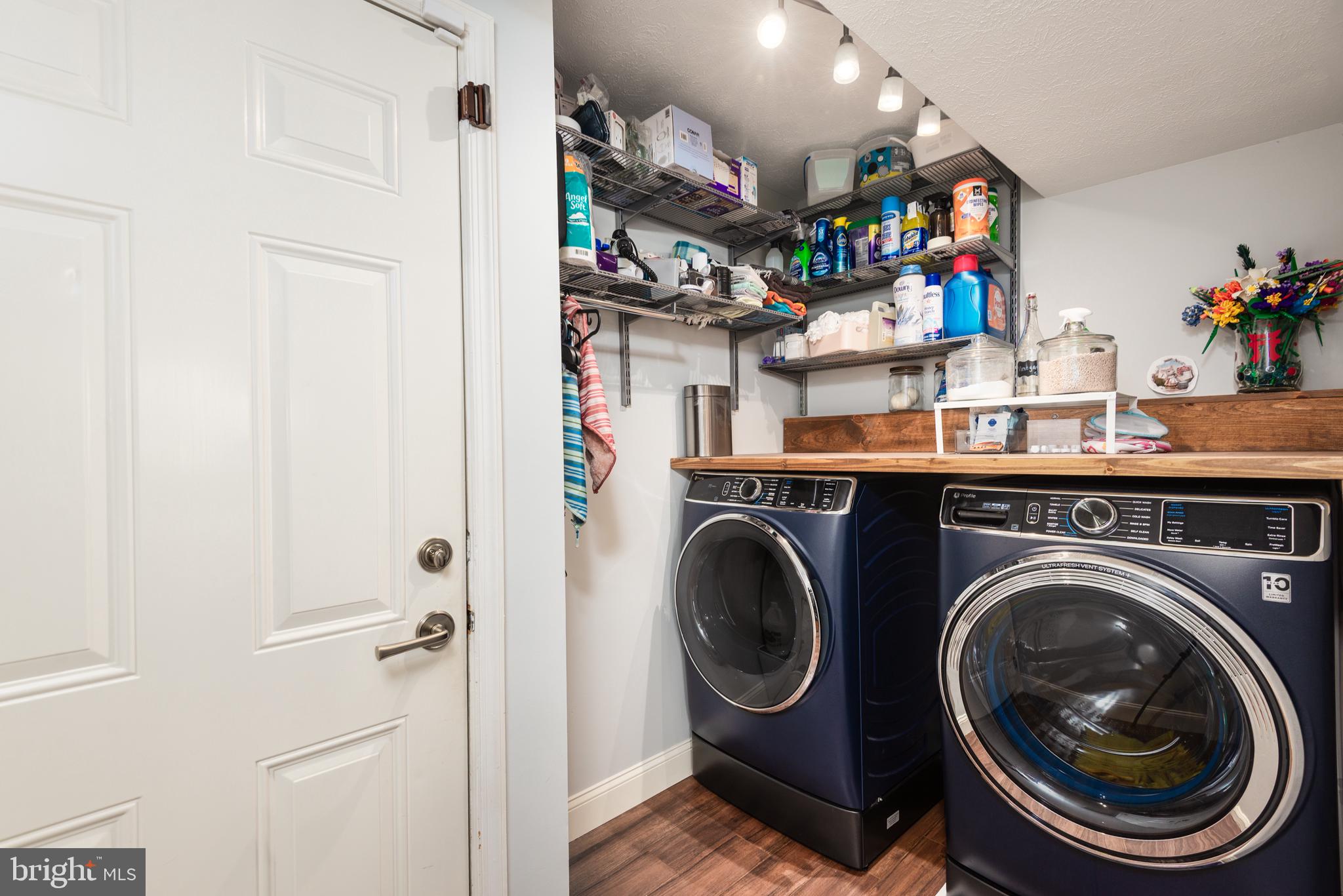 1709 Cattail Commons Way Denton, MD 21629 - Photo 12 of 36 Modern laundry nook with smart storage.