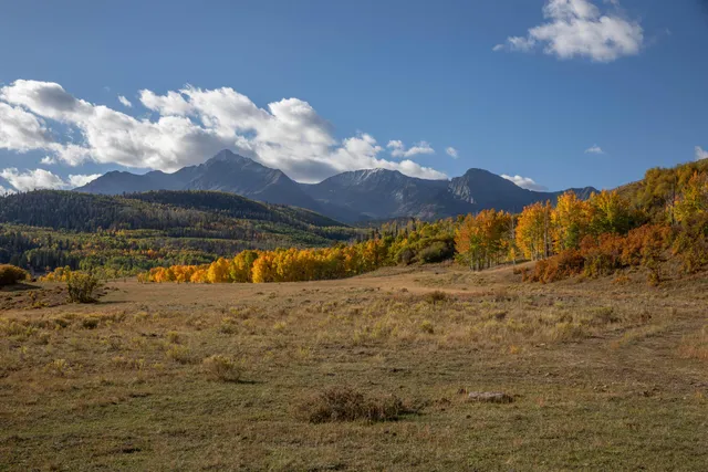 a view of mountain with lake