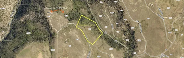 a view of an ocean and a mountain