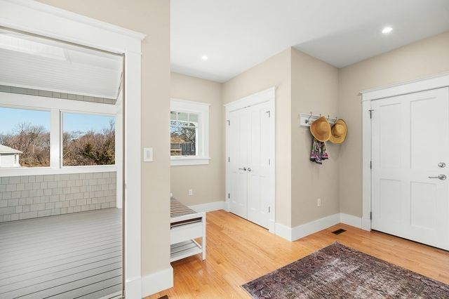a view of room with window and hardwood floor
