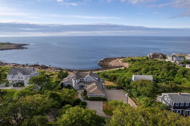 an aerial view of a house with a garden