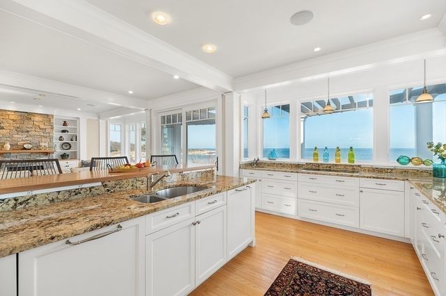 a large bathroom with a large tub and sink