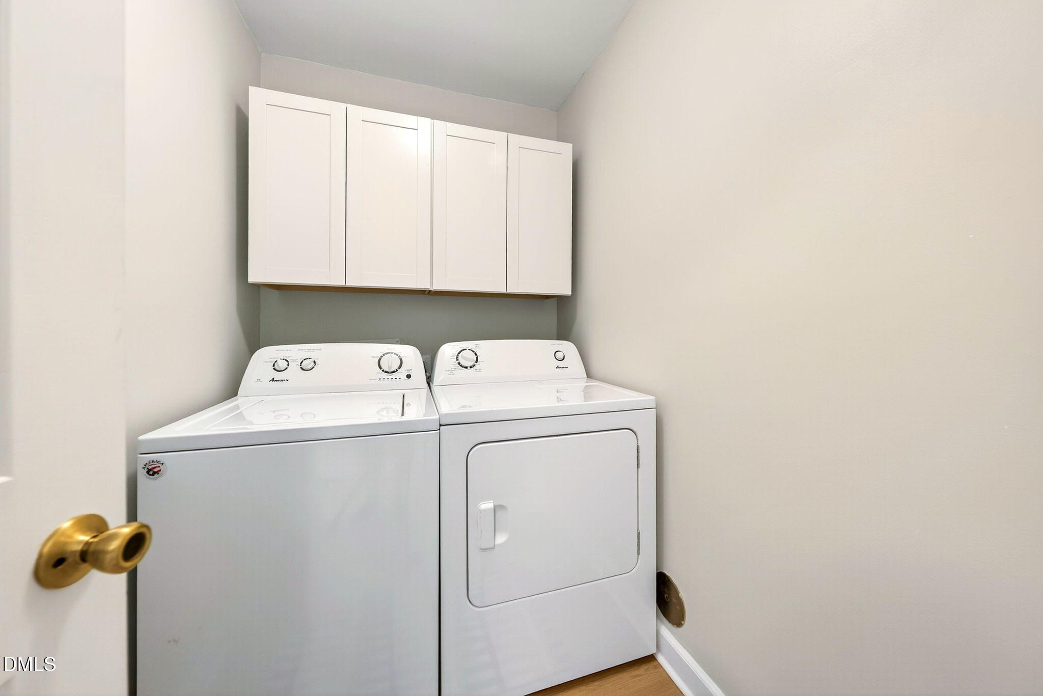 3307 Tarleton West Durham, NC 27713 - Photo 27 of 39 The sellers installed storage cabinets in the laundry room. The washer and dryer convey.