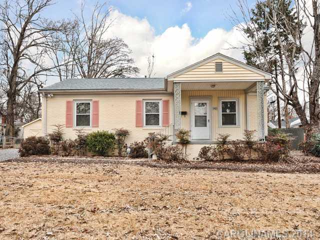 1465 Cortland Road West Charlotte, NC 28209 - Photo 1 of 10 a front view of a house with a yard