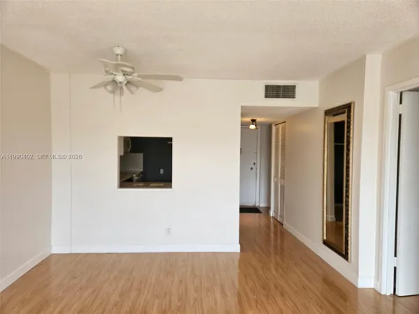 a view of a livingroom with a wooden floor