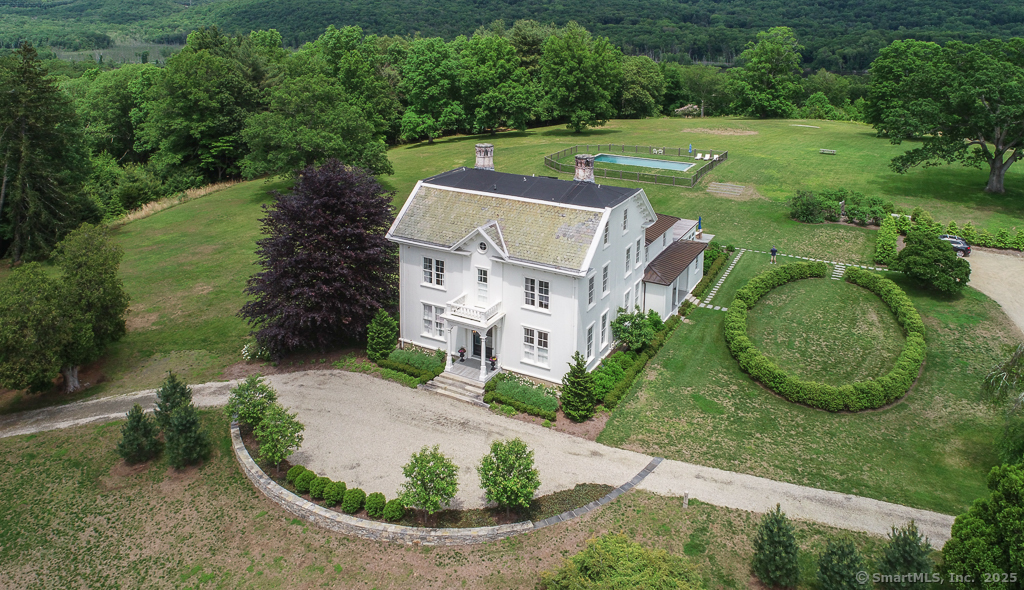 114 Walkley Hill Road Haddam, CT 06438 - Photo 1 of 28 an aerial view of a house with outdoor space and trees all around