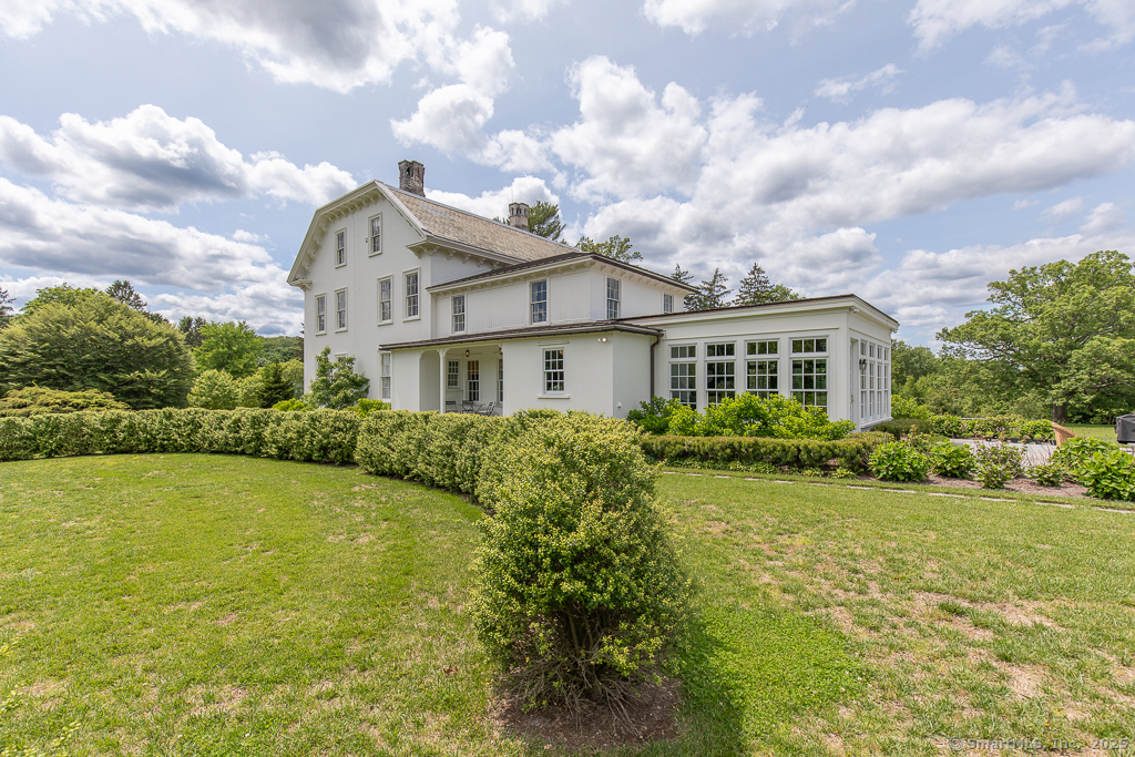 114 Walkley Hill Road Haddam, CT 06438 - Photo 3 of 28 a front view of a house with garden