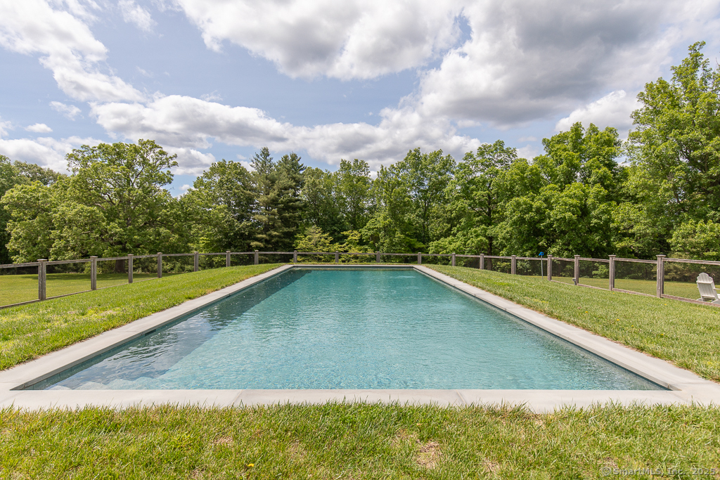 114 Walkley Hill Road Haddam, CT 06438 - Photo 4 of 28 a view of a swimming pool with a yard