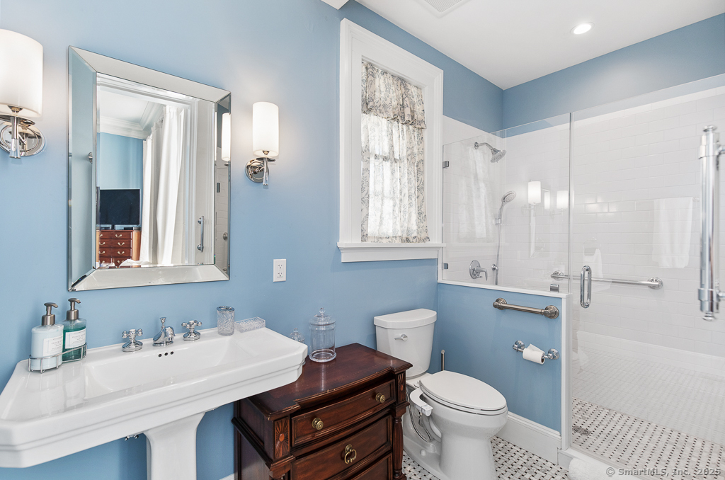 114 Walkley Hill Road Haddam, CT 06438 - Photo 10 of 28 a bathroom with a sink toilet vanity and shower