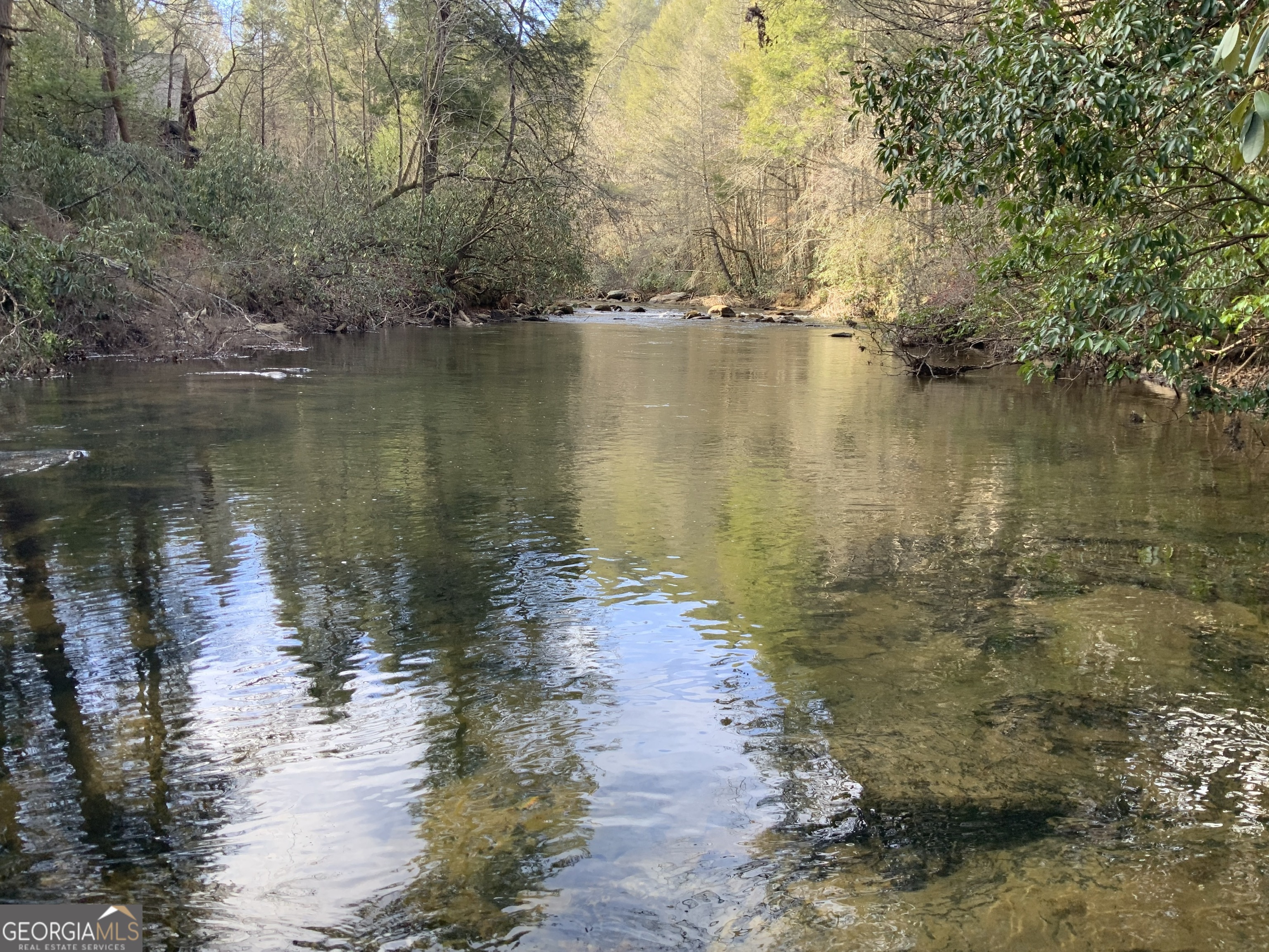 0 Fightingtown Creek Road McCaysville, GA 30555 - Photo 8 of 36 a view of a lake with houses