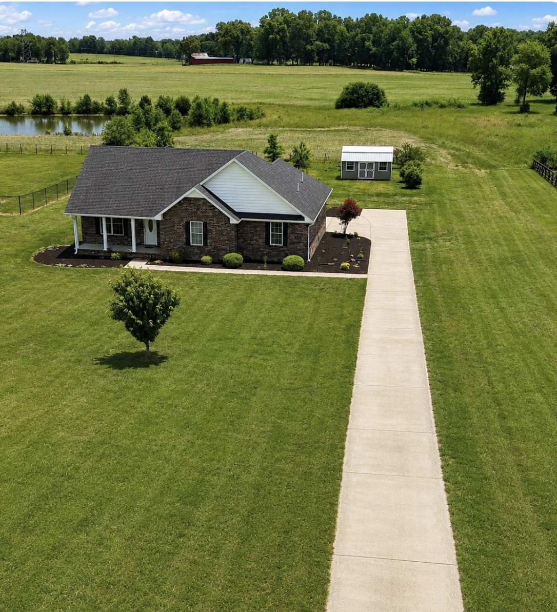 663 Jackson Road Portland, TN 37148 - Photo 3 of 32 a aerial view of a house with big yard