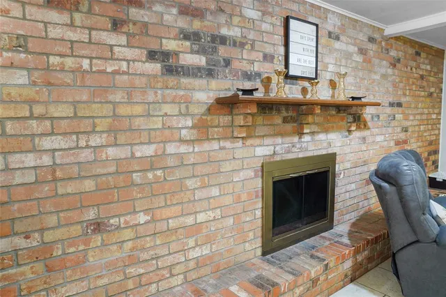 a fireplace with a rug