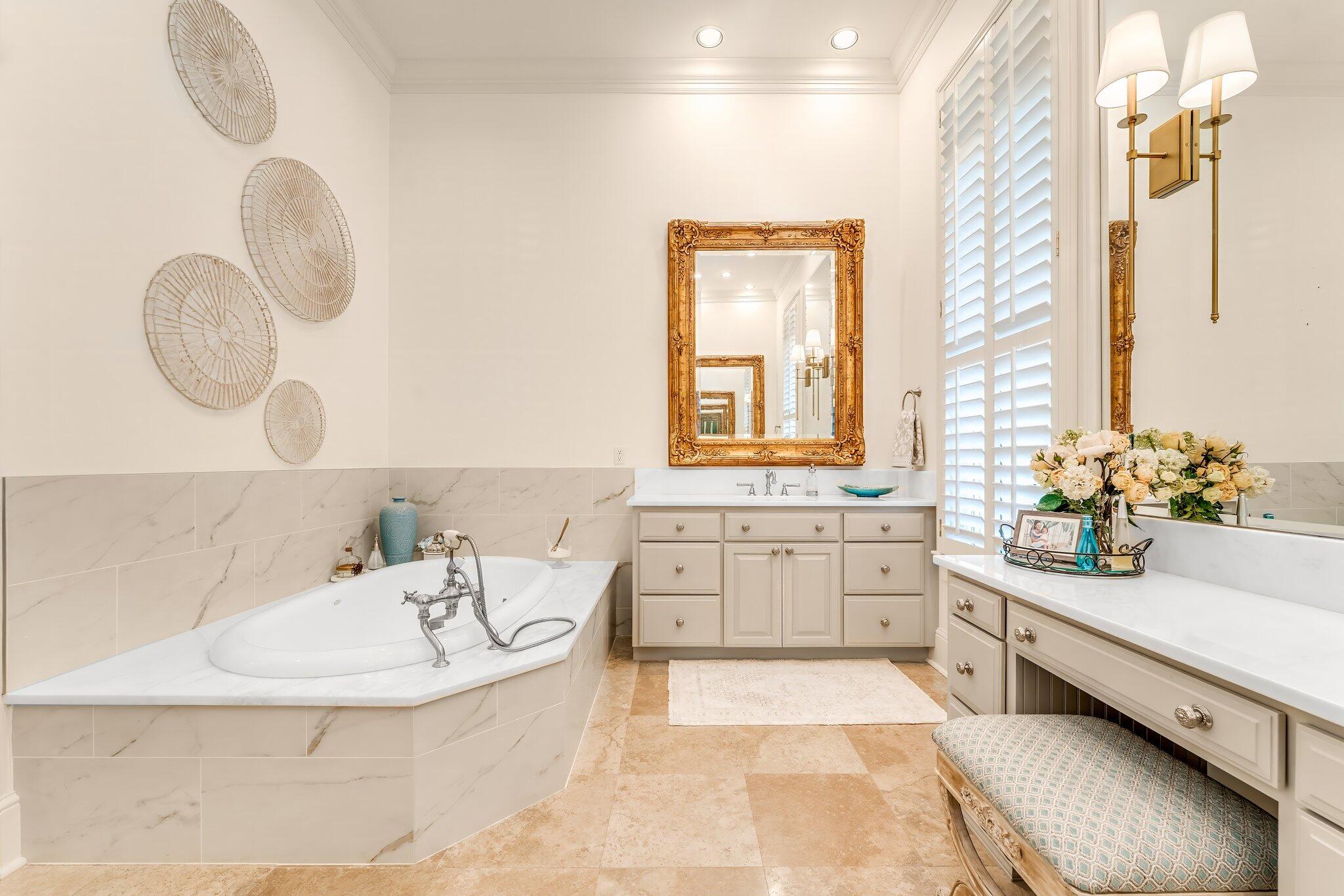 286 Rue Caribe Miramar Beach, FL 32550 - Photo 16 of 79 a bathroom with a tub sink and mirror