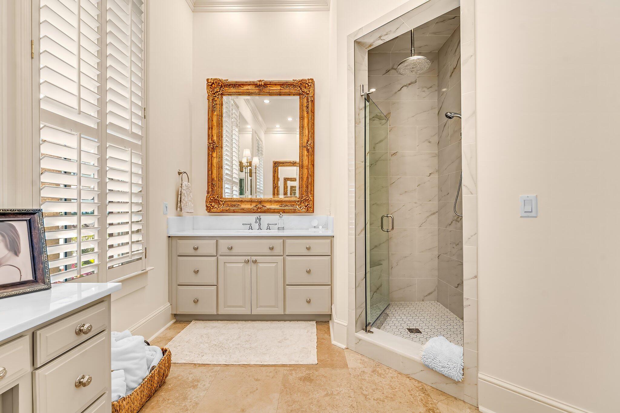 286 Rue Caribe Miramar Beach, FL 32550 - Photo 17 of 79 a bathroom with a shower sink and mirror