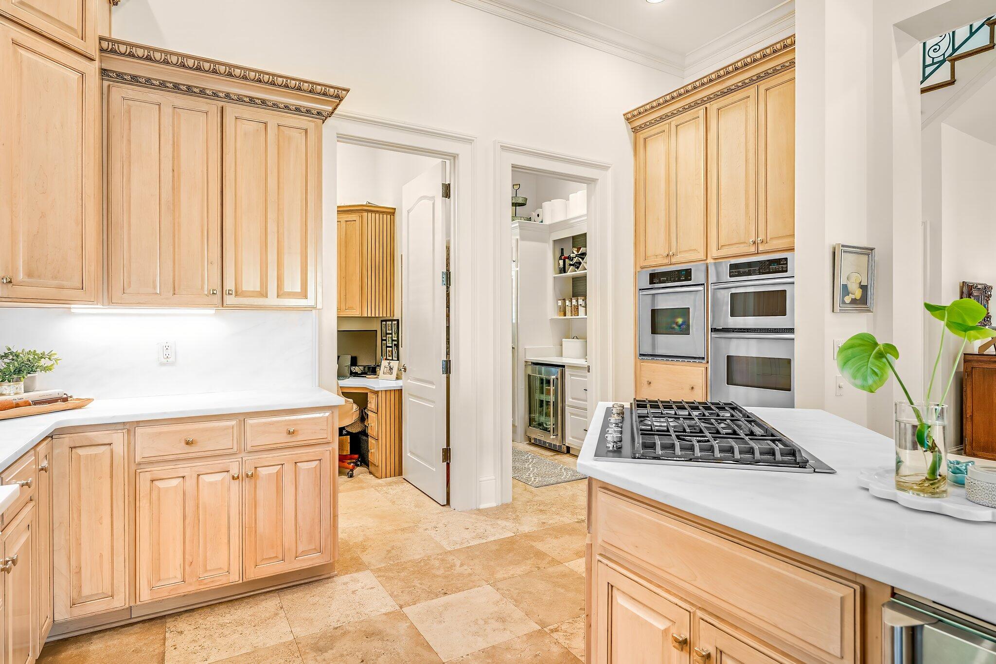 286 Rue Caribe Miramar Beach, FL 32550 - Photo 21 of 79 a kitchen with stainless steel appliances a refrigerator and a stove top oven