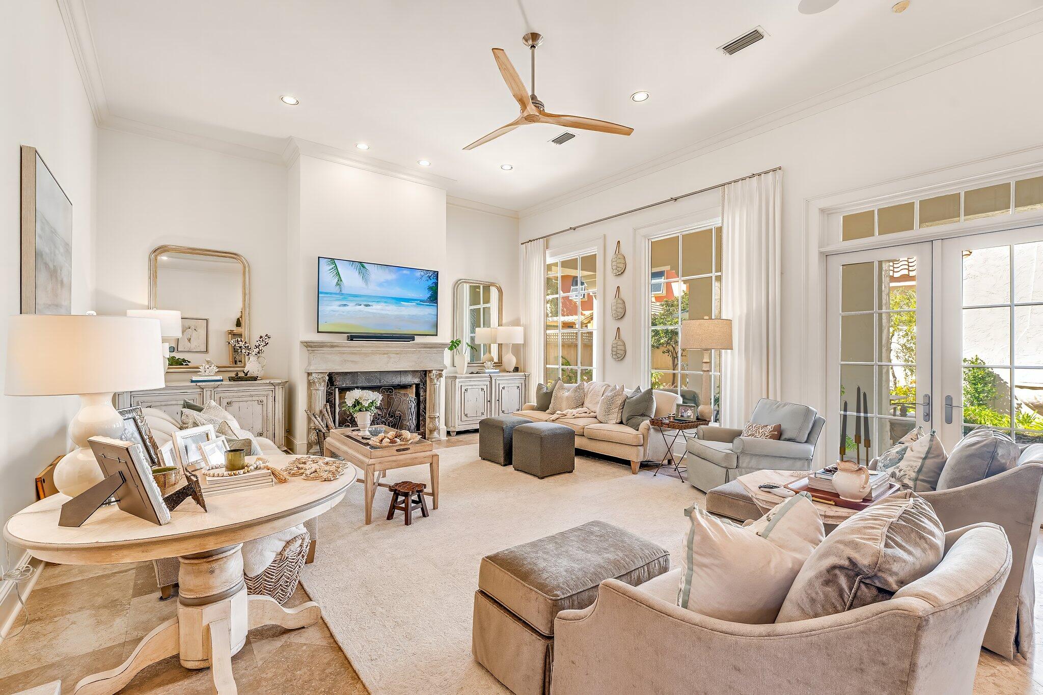 286 Rue Caribe Miramar Beach, FL 32550 - Photo 25 of 79 a living room with fireplace furniture and a large window