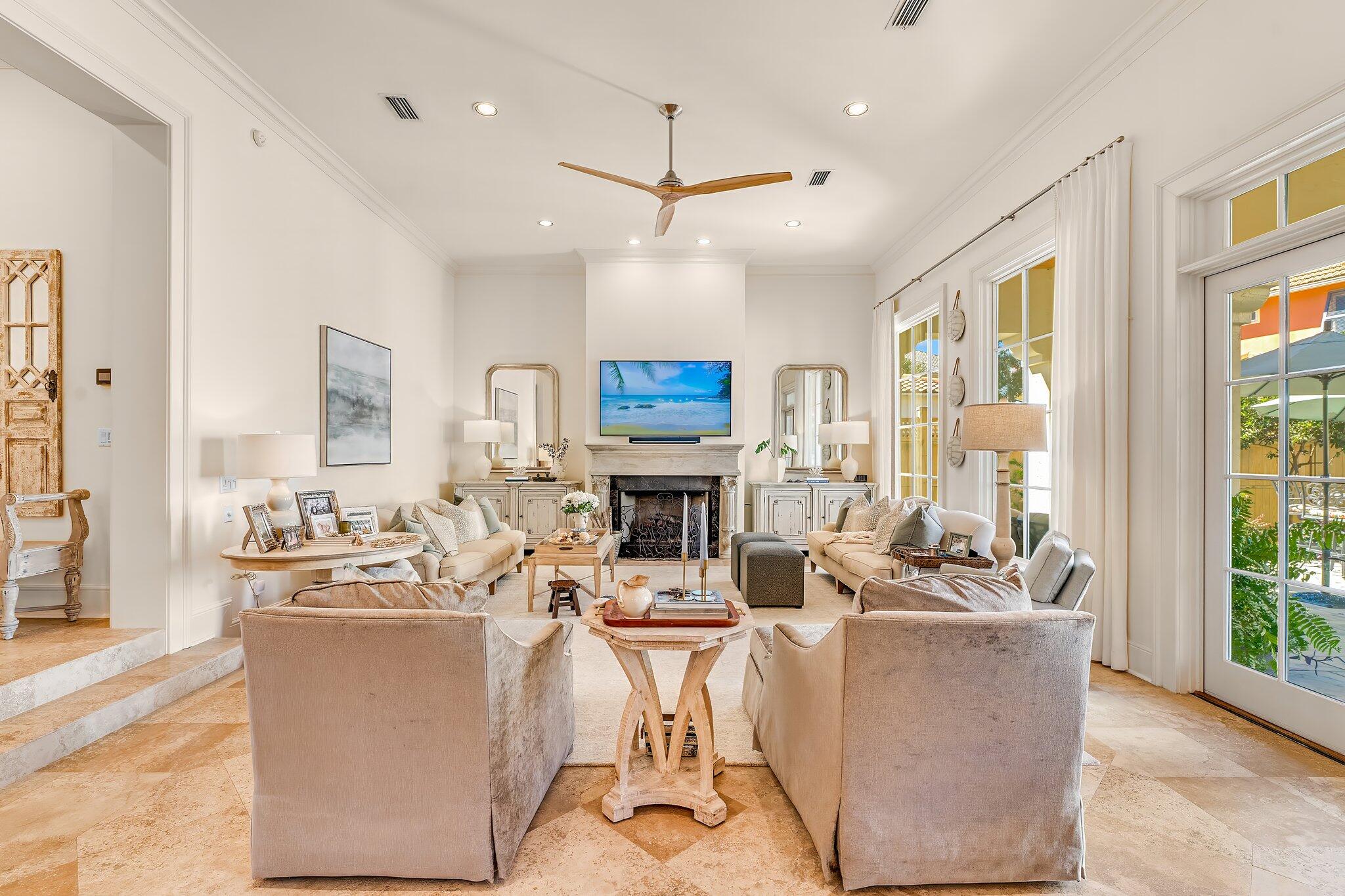 286 Rue Caribe Miramar Beach, FL 32550 - Photo 26 of 79 a living room with fireplace furniture and a large window