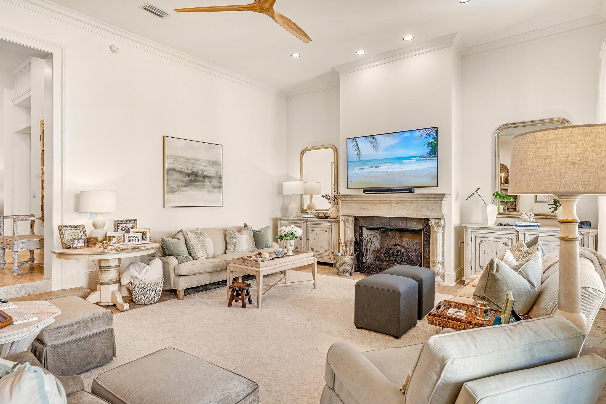 286 Rue Caribe Miramar Beach, FL 32550 - Photo 27 of 79 a living room with furniture and a fireplace