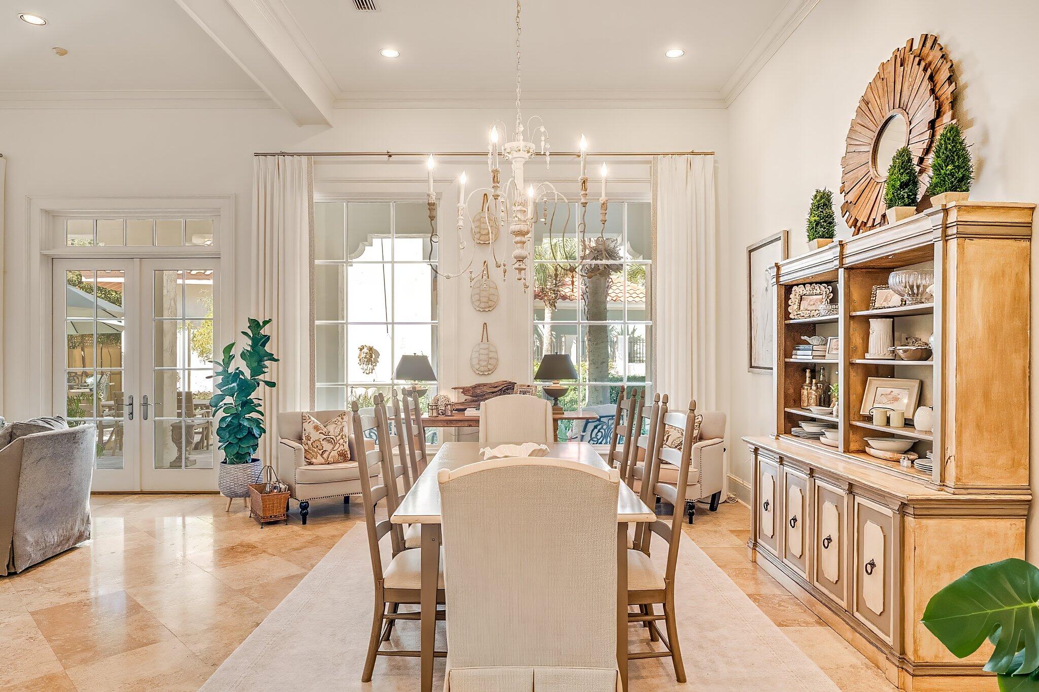 286 Rue Caribe Miramar Beach, FL 32550 - Photo 31 of 79 a living room with furniture a chandelier and wooden floor