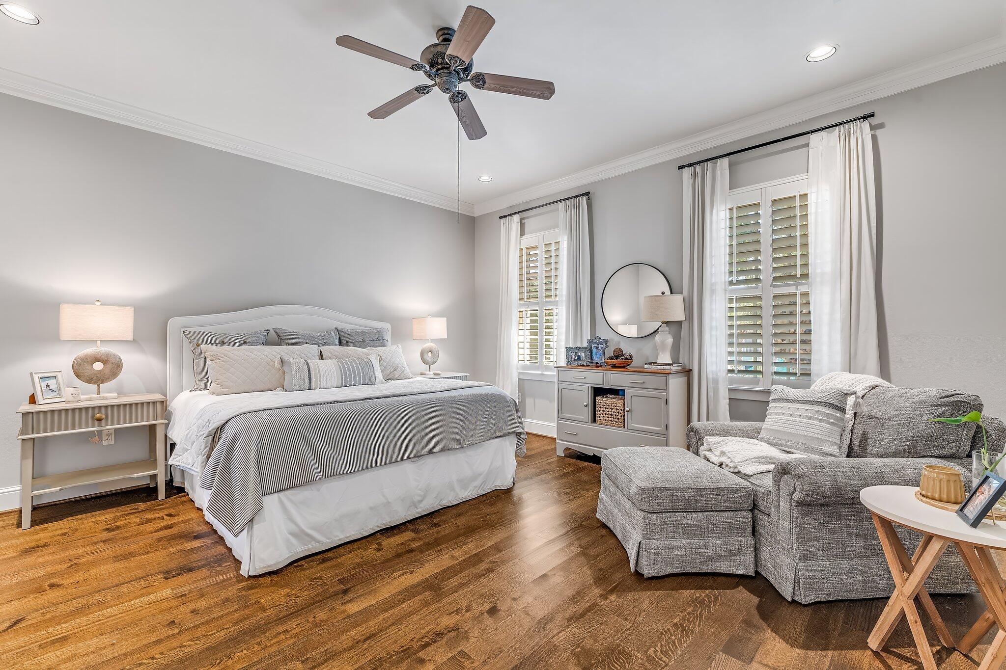 286 Rue Caribe Miramar Beach, FL 32550 - Photo 43 of 79 a bedroom with a large bed and a chandelier