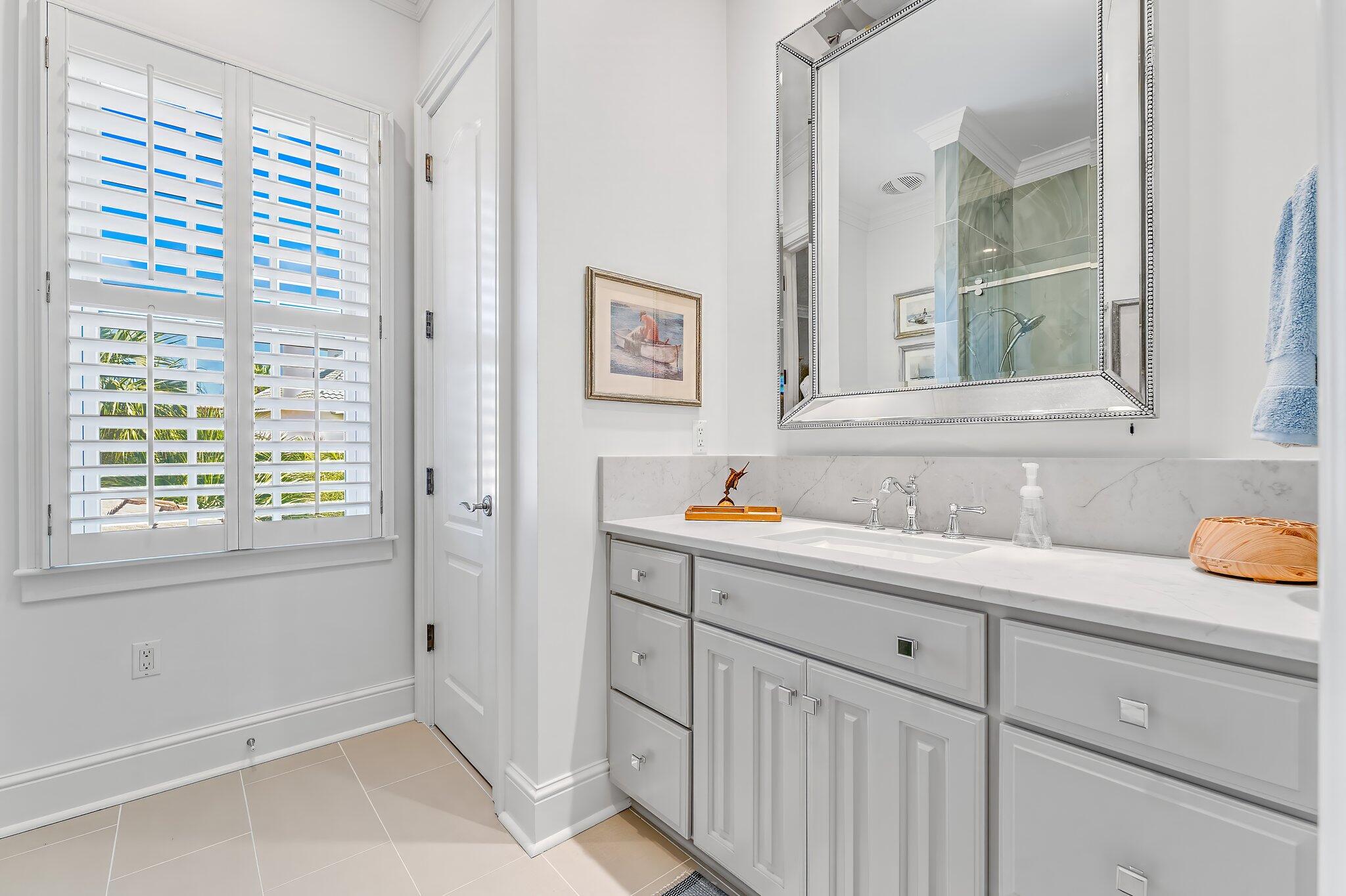 286 Rue Caribe Miramar Beach, FL 32550 - Photo 46 of 79 a bathroom with a sink and a mirror
