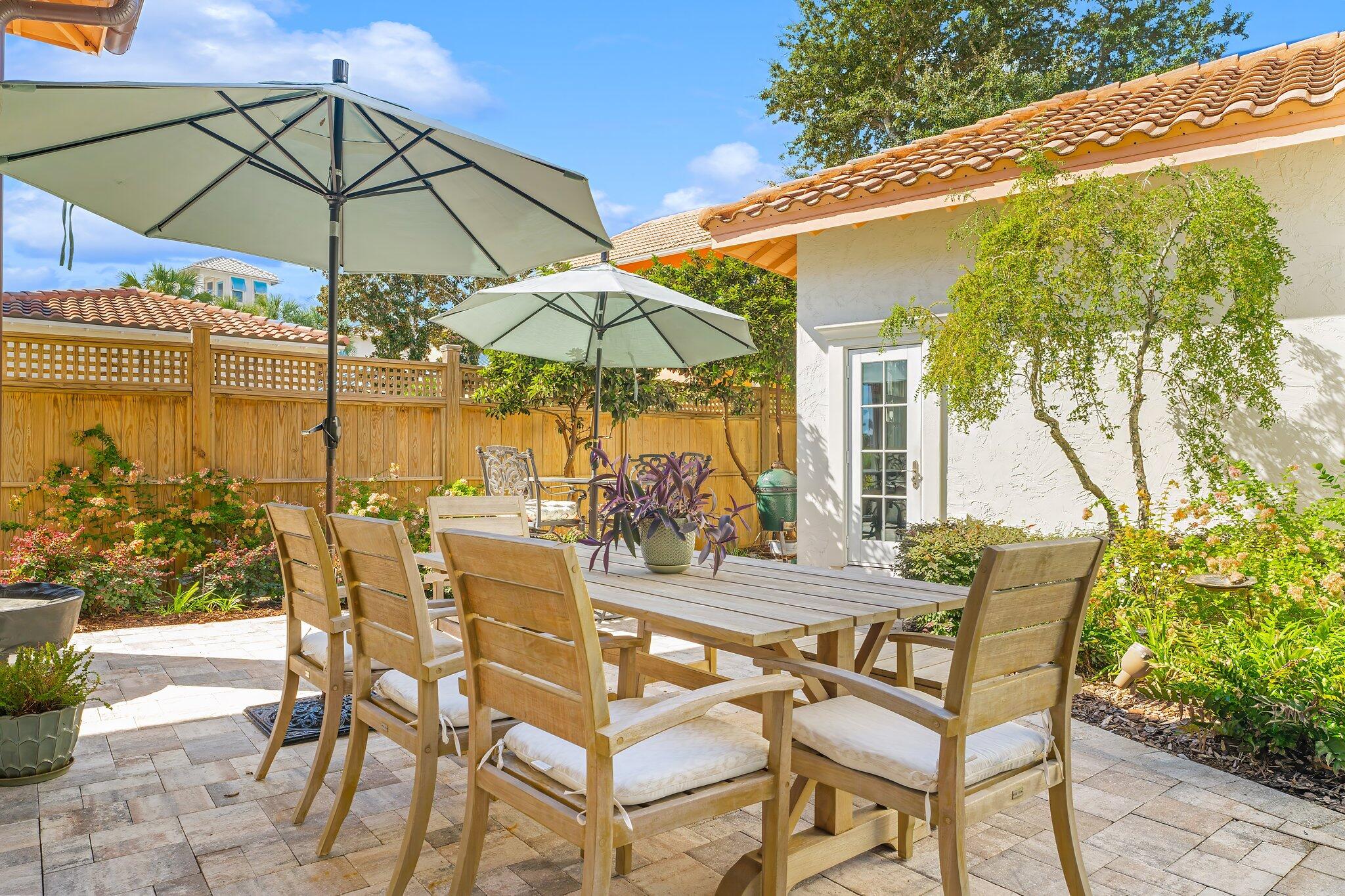 286 Rue Caribe Miramar Beach, FL 32550 - Photo 48 of 79 a view of an outdoor space with furniture and umbrella