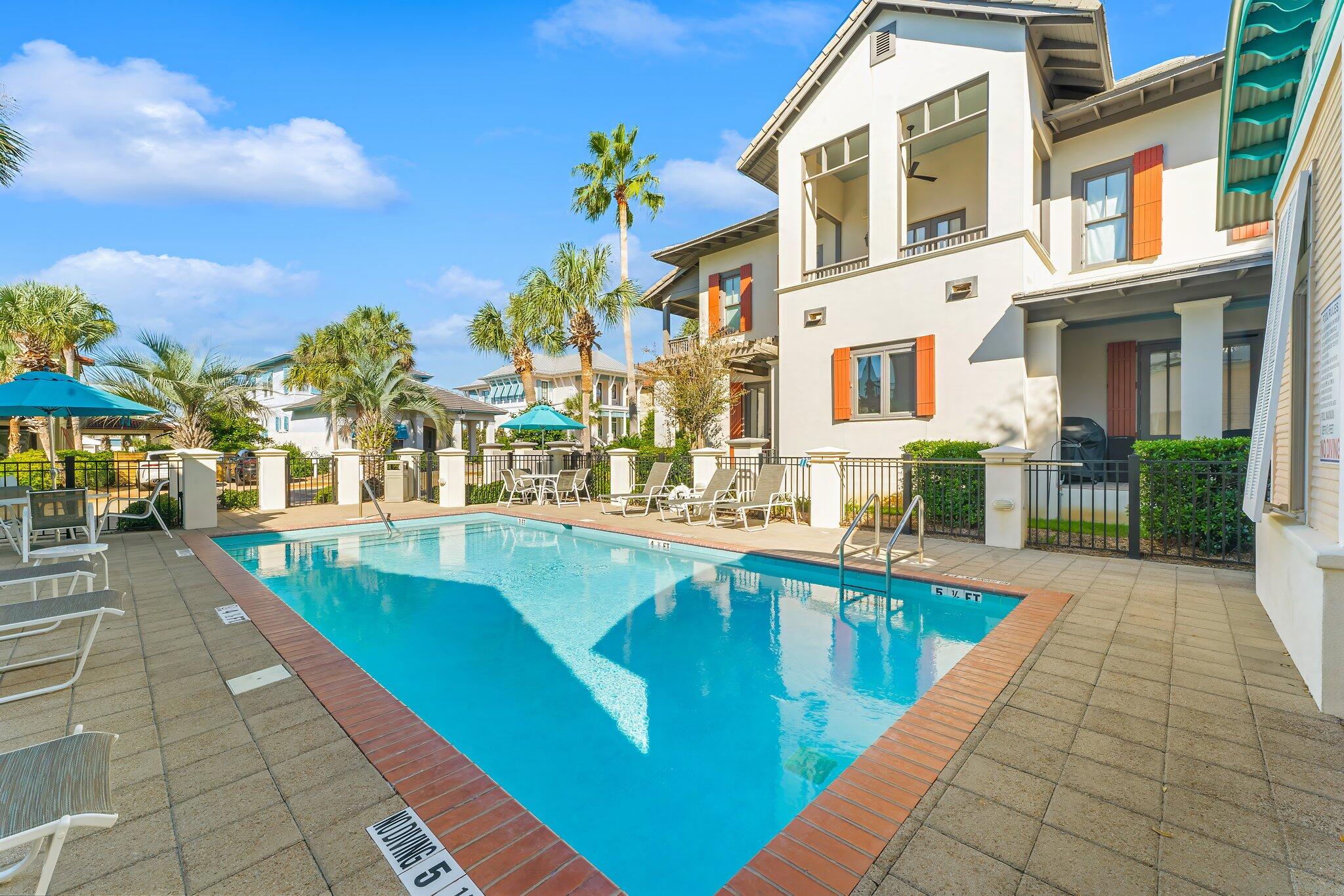 286 Rue Caribe Miramar Beach, FL 32550 - Photo 73 of 79 a swimming pool with outdoor seating