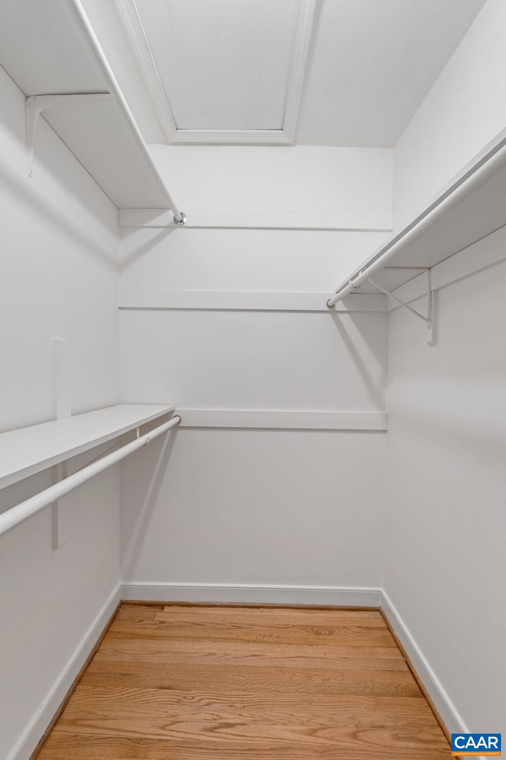 2752 Hydraulic Road Charlottesville, VA 22901 - Photo 21 of 41 a view of a room with racks on the wall