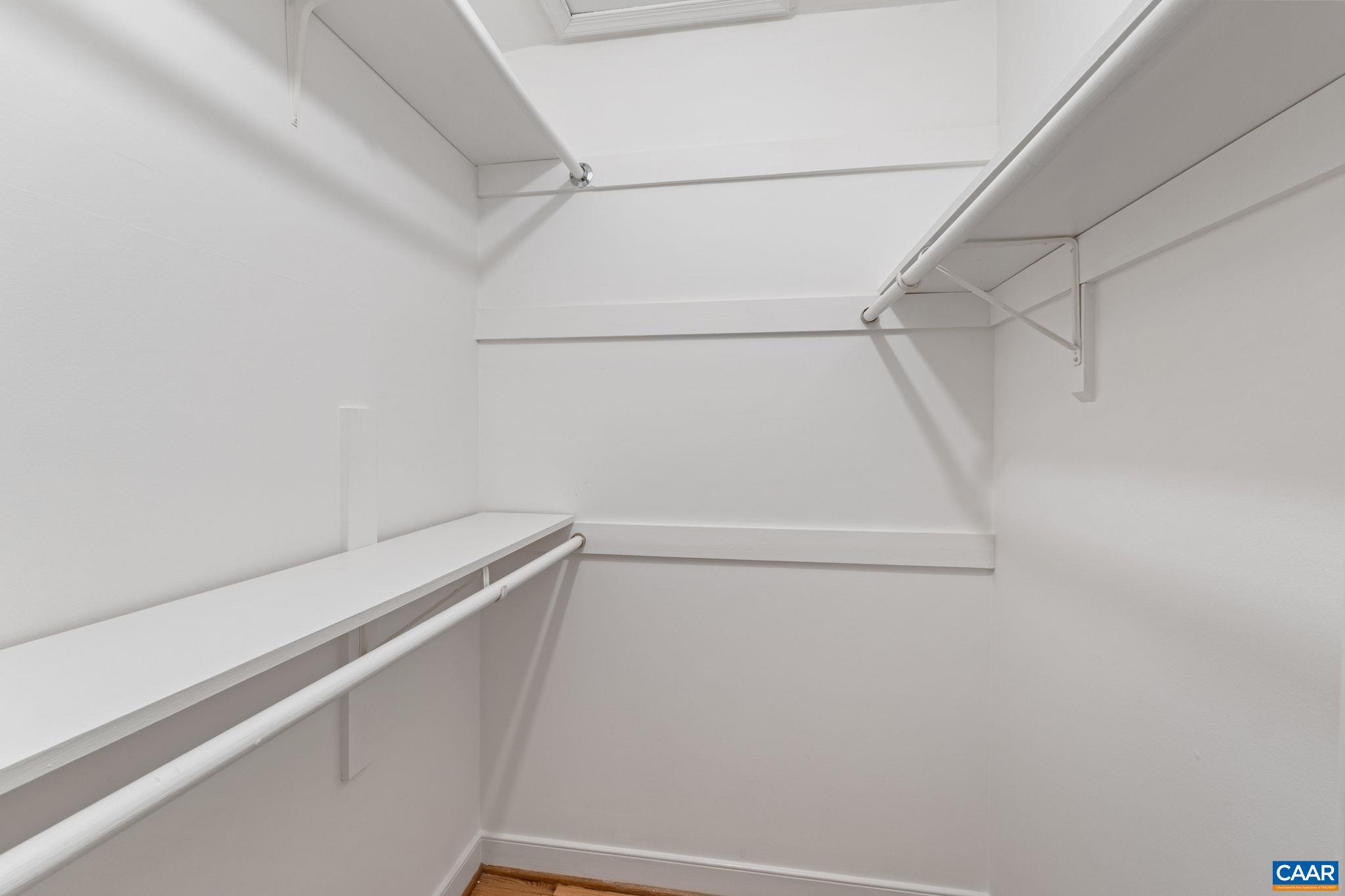 2752 Hydraulic Road Charlottesville, VA 22901 - Photo 22 of 41 a view of a room with racks on the wall