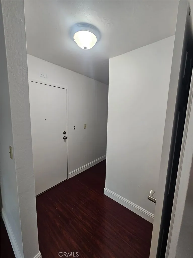 75 Western Shore Lane, Unit 1 San Francisco, CA 94102 - Photo 14 of 17 an empty room with wooden floor