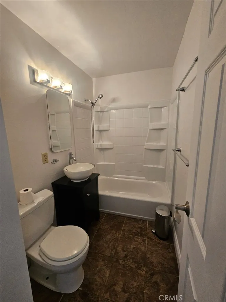75 Western Shore Lane, Unit 1 San Francisco, CA 94102 - Photo 15 of 17 a bathroom with a sink toilet and shower