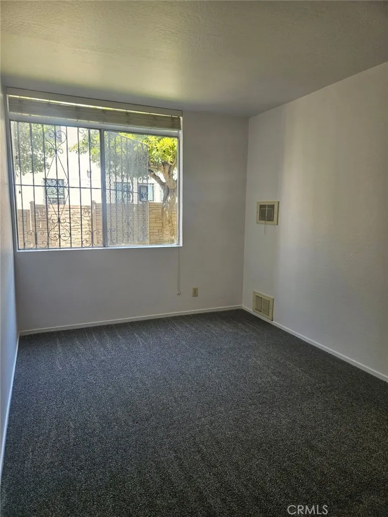 75 Western Shore Lane, Unit 1 San Francisco, CA 94102 - Photo 16 of 17 an empty room with a window