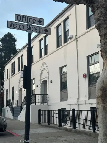 a view of a building with a street