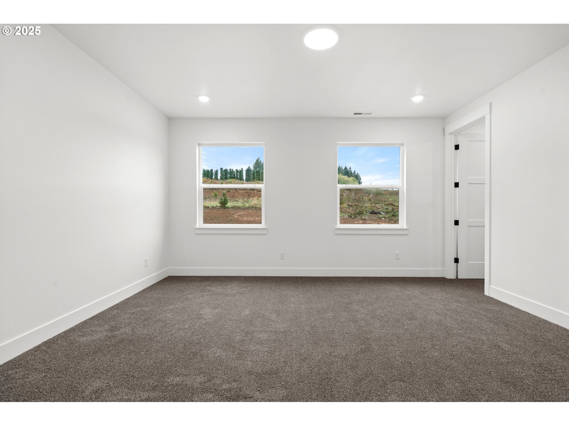 148 Fries Road Winlock, WA 98596 - Photo 17 of 39 a view of an empty room with a window