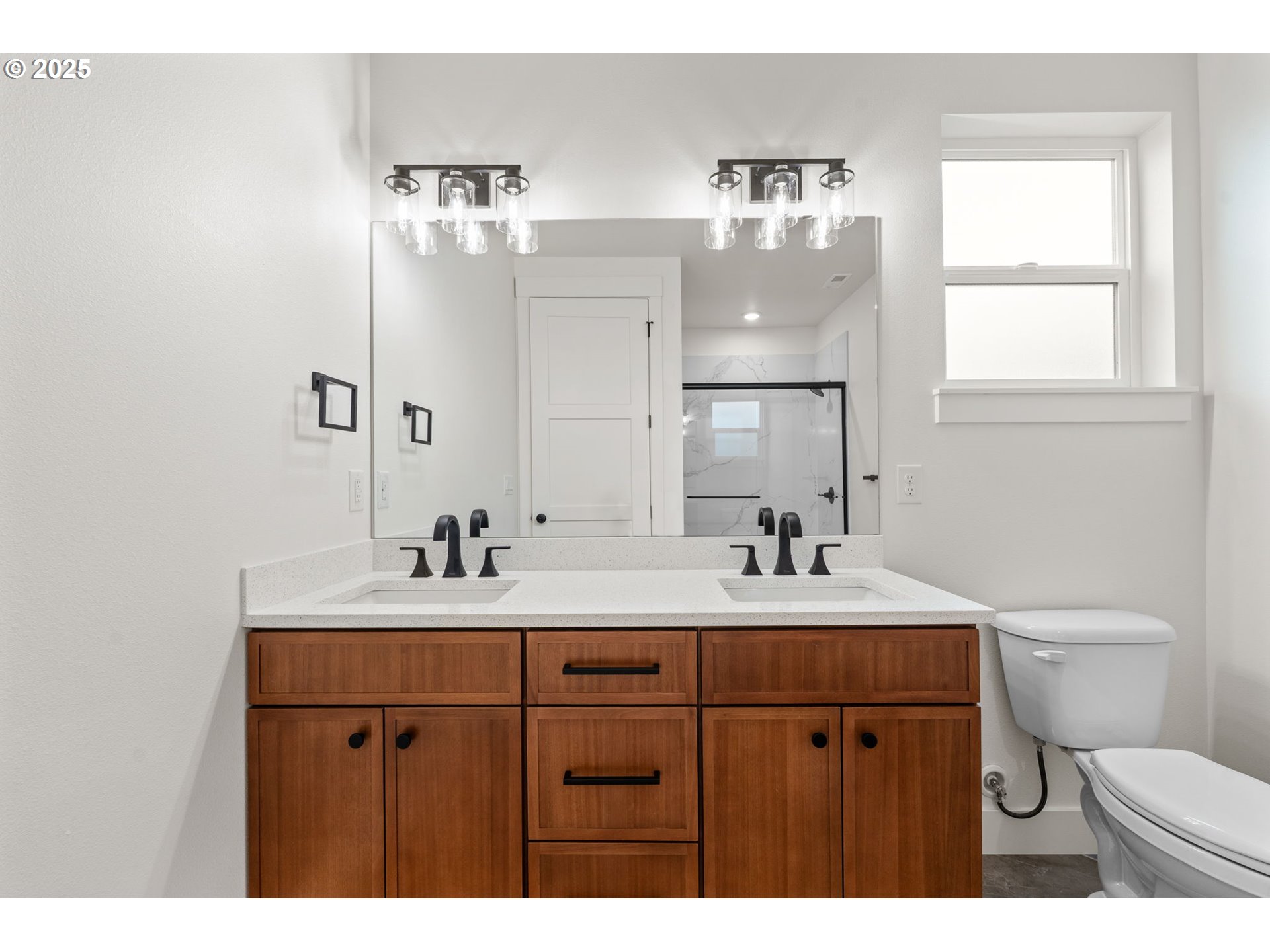 148 Fries Road Winlock, WA 98596 - Photo 19 of 39 a bathroom with a sink a toilet and mirror