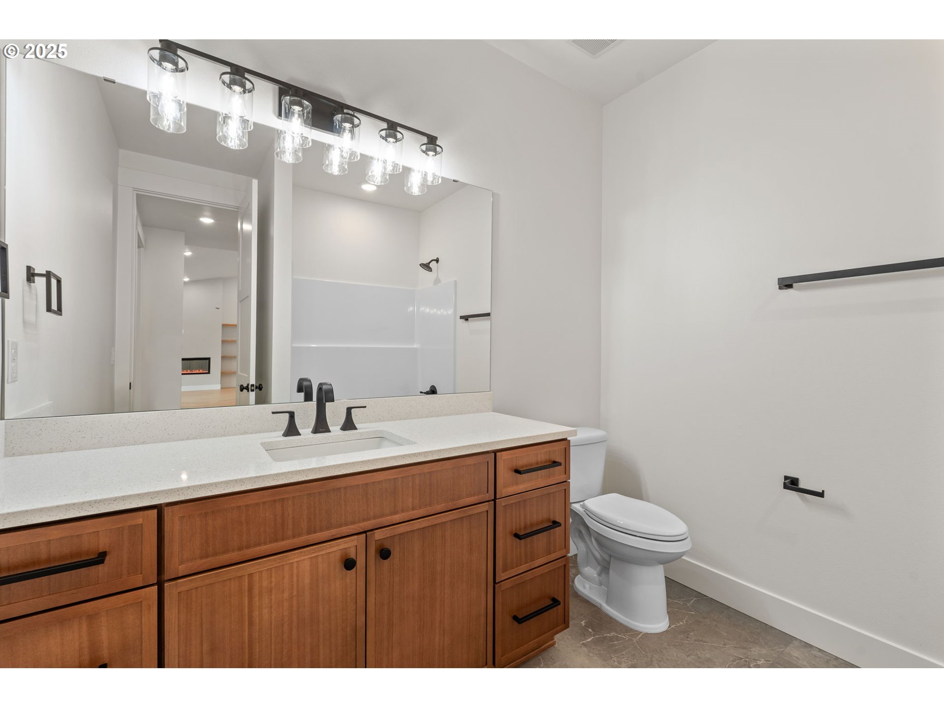 148 Fries Road Winlock, WA 98596 - Photo 26 of 39 a bathroom with a sink a toilet a mirror and vanity