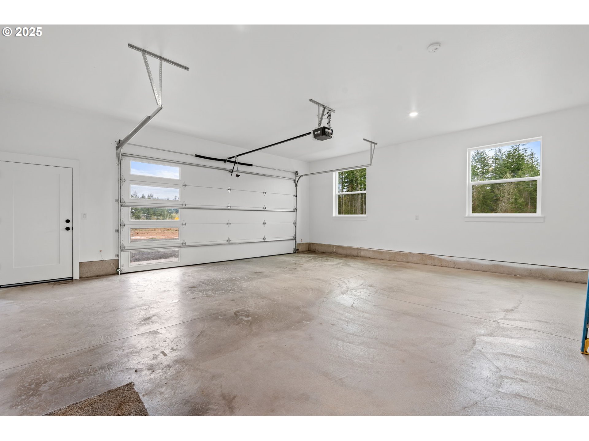 148 Fries Road Winlock, WA 98596 - Photo 28 of 39 a view of a garage with wooden floors