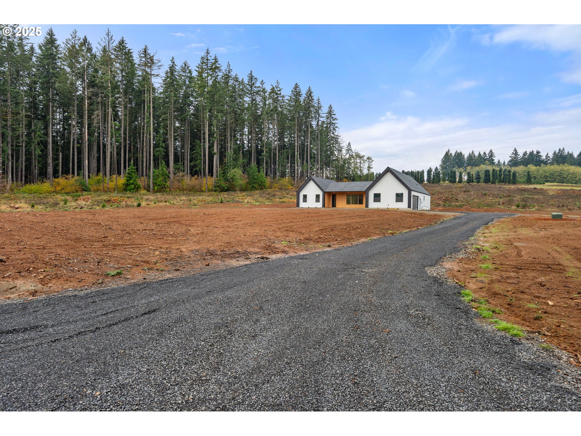148 Fries Road Winlock, WA 98596 - Photo 4 of 39 a view of a road with a yard