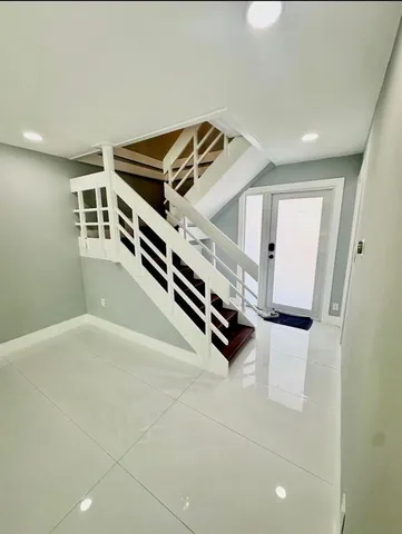 a large kitchen with stainless steel appliances granite countertop a stove and a sink