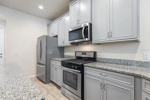 a view of a garden from a balcony