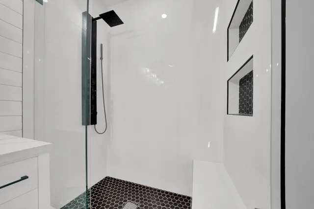 an aerial view of residential house with outdoor space and swimming pool