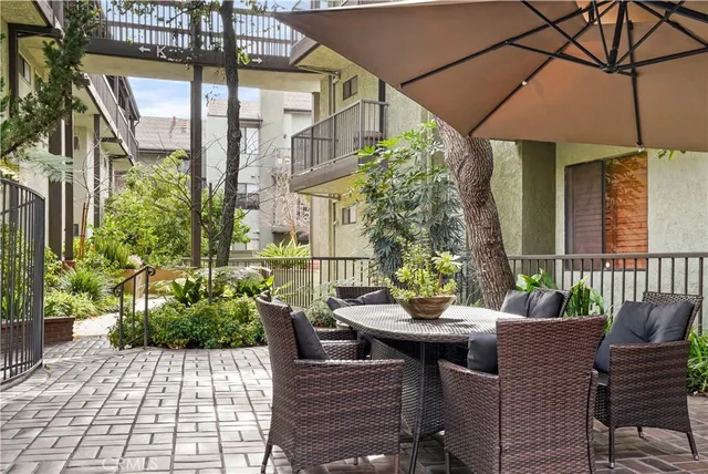 a view of parking garage with cars