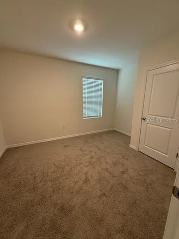 an empty room with an entryway
