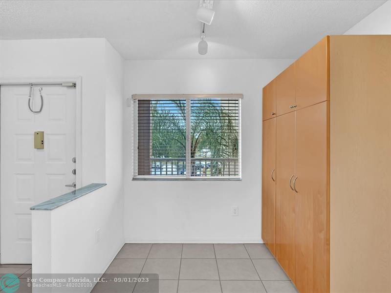 9551 Weldon Circle, Unit E311 Tamarac, FL 33321 - Photo 11 of 64 a view of an empty room with a window