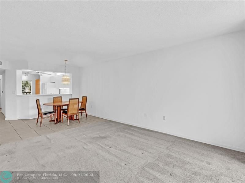 9551 Weldon Circle, Unit E311 Tamarac, FL 33321 - Photo 20 of 64 a view of a dining room with furniture