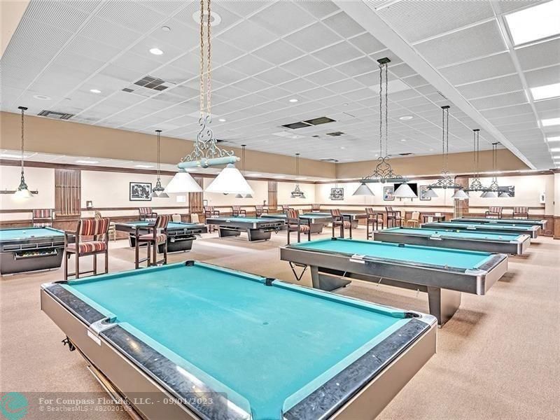 9551 Weldon Circle, Unit E311 Tamarac, FL 33321 - Photo 55 of 64 a room with lots of furniture and view