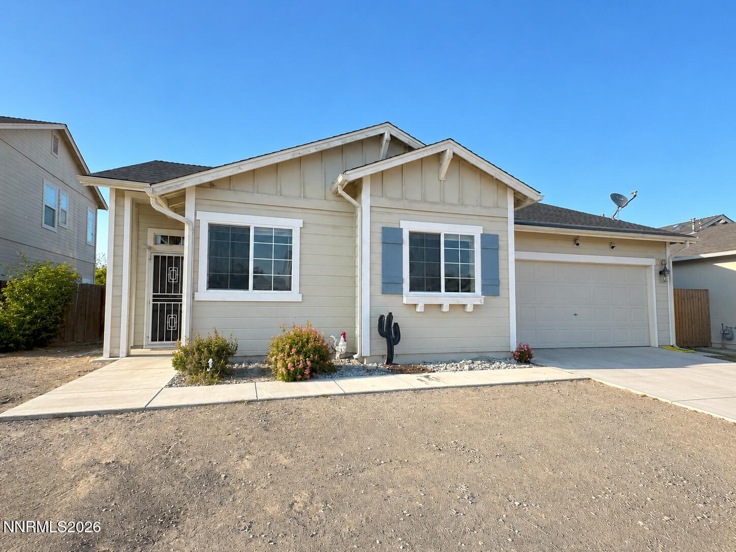296 Fallen Leaf Lane Fernley, NV 89408 - Photo 1 of 31 a front view of a house with porch