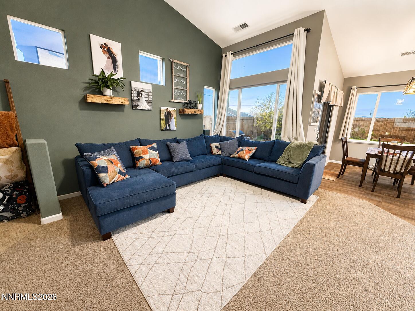 296 Fallen Leaf Lane Fernley, NV 89408 - Photo 14 of 31 a living room with furniture and a large window
