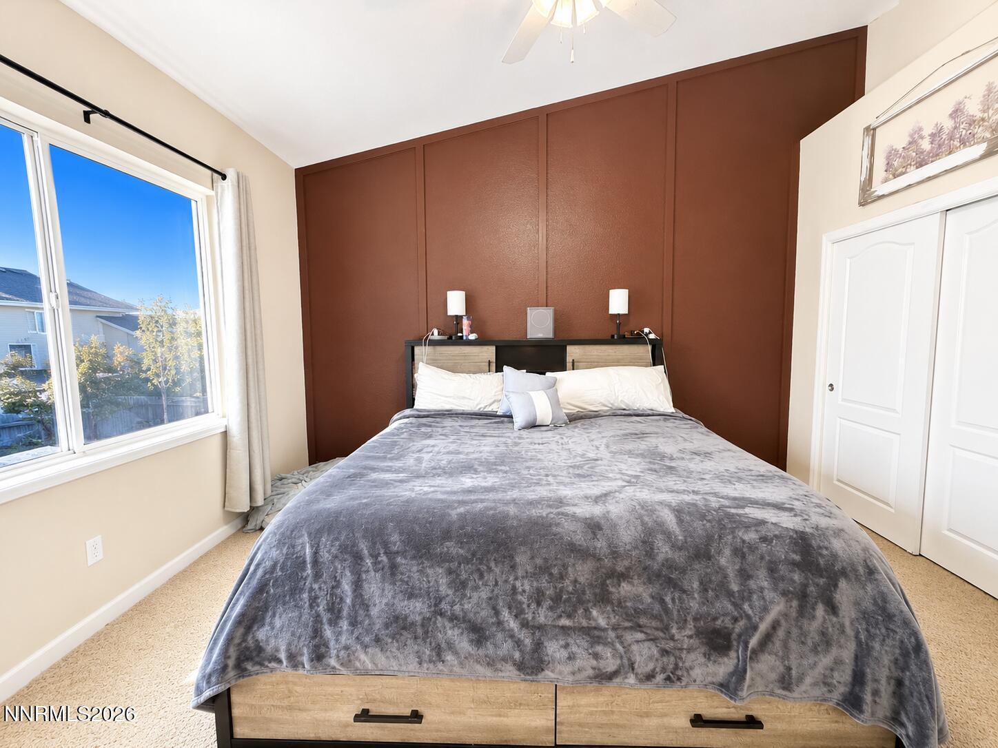 296 Fallen Leaf Lane Fernley, NV 89408 - Photo 25 of 31 a bedroom with a bed and window